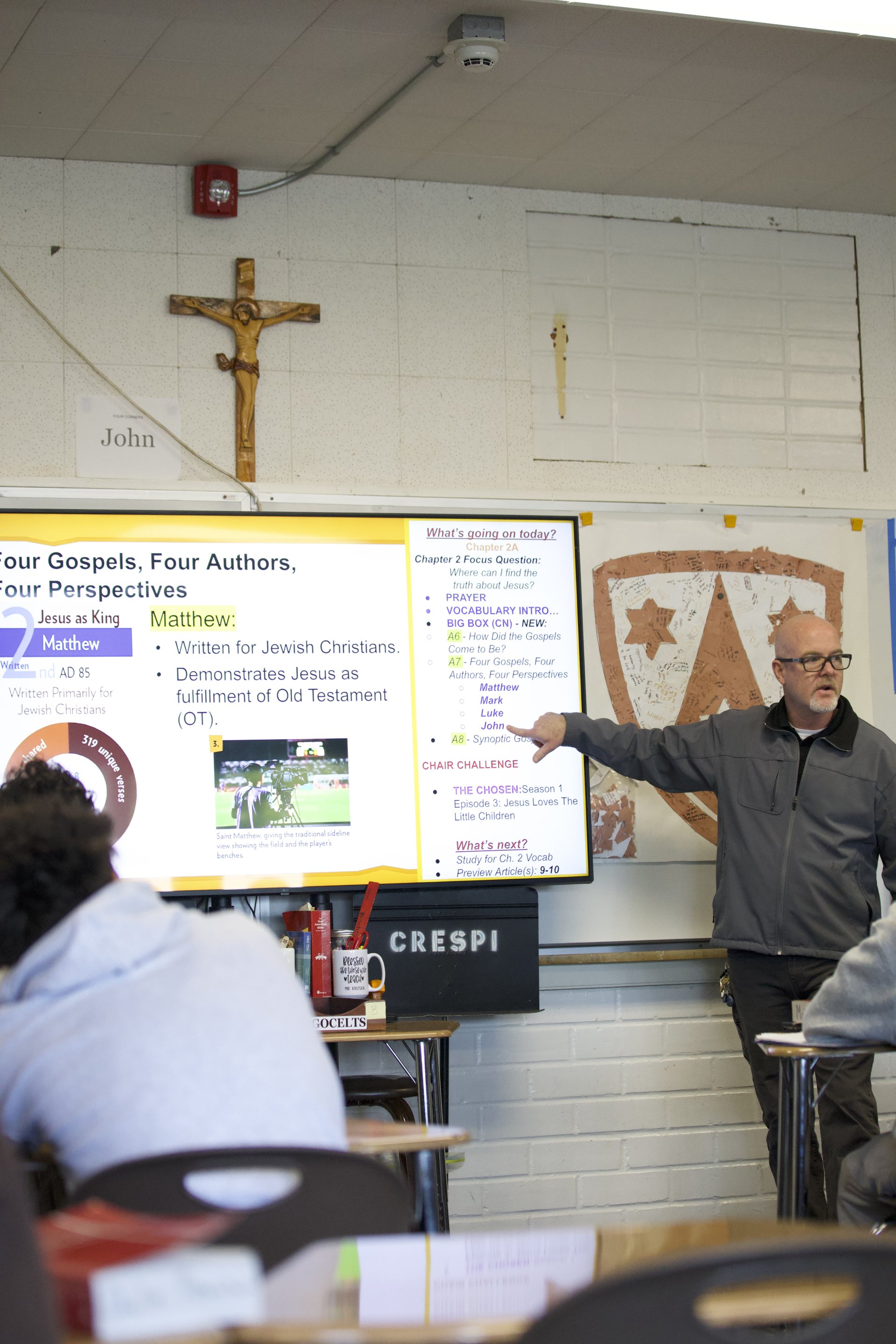 a theology teacher in the classroom