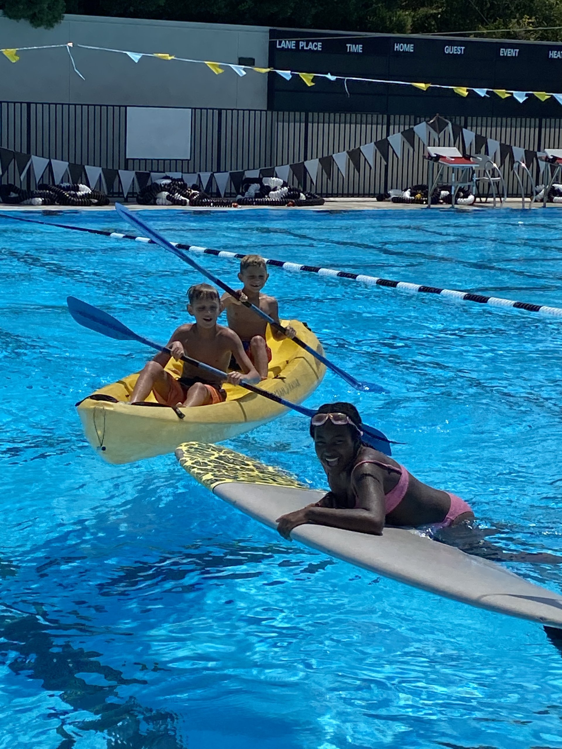 Boys on a paddle board